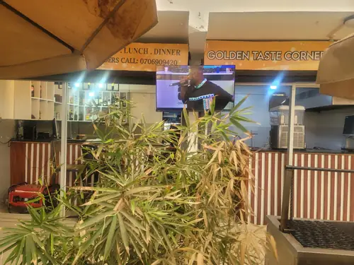 Ugali and greens plate at Golden Taste Corner, Rwandan restaurant in Nairobi